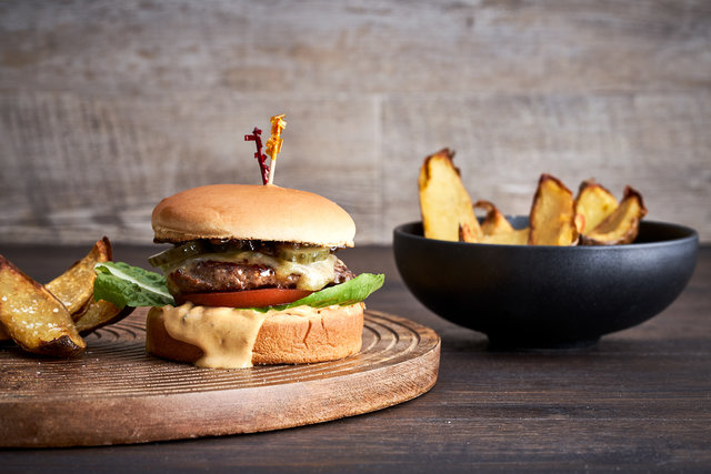 Teaser image for Classic grass-fed Wagyu cheese burger with crispy potato skins